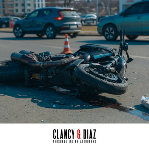 Motorcycle lying on the road with debris scattered around after a Brentwood motorcycle accident