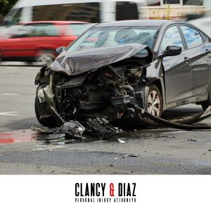 The smashed front end of a car after a serious car accident in Concord, CA